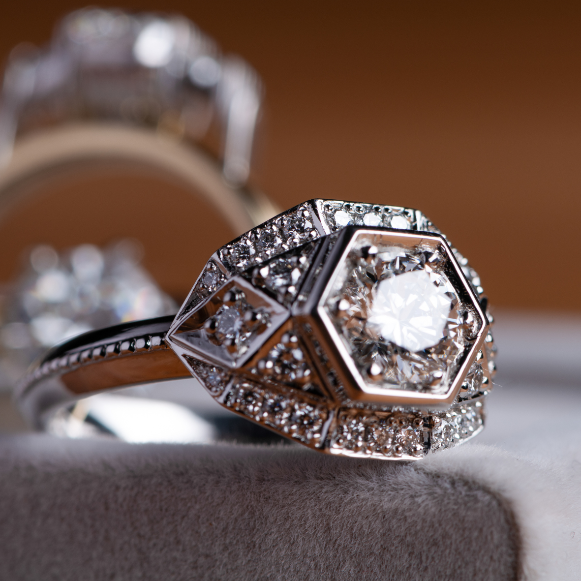 close up of platinum ring with round brilliant cut diamonds