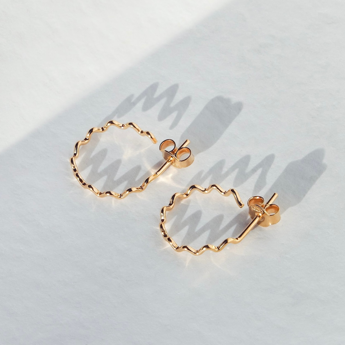 Small Crinkle Hoops in Oxidised Sterling Silver by Daria Fox