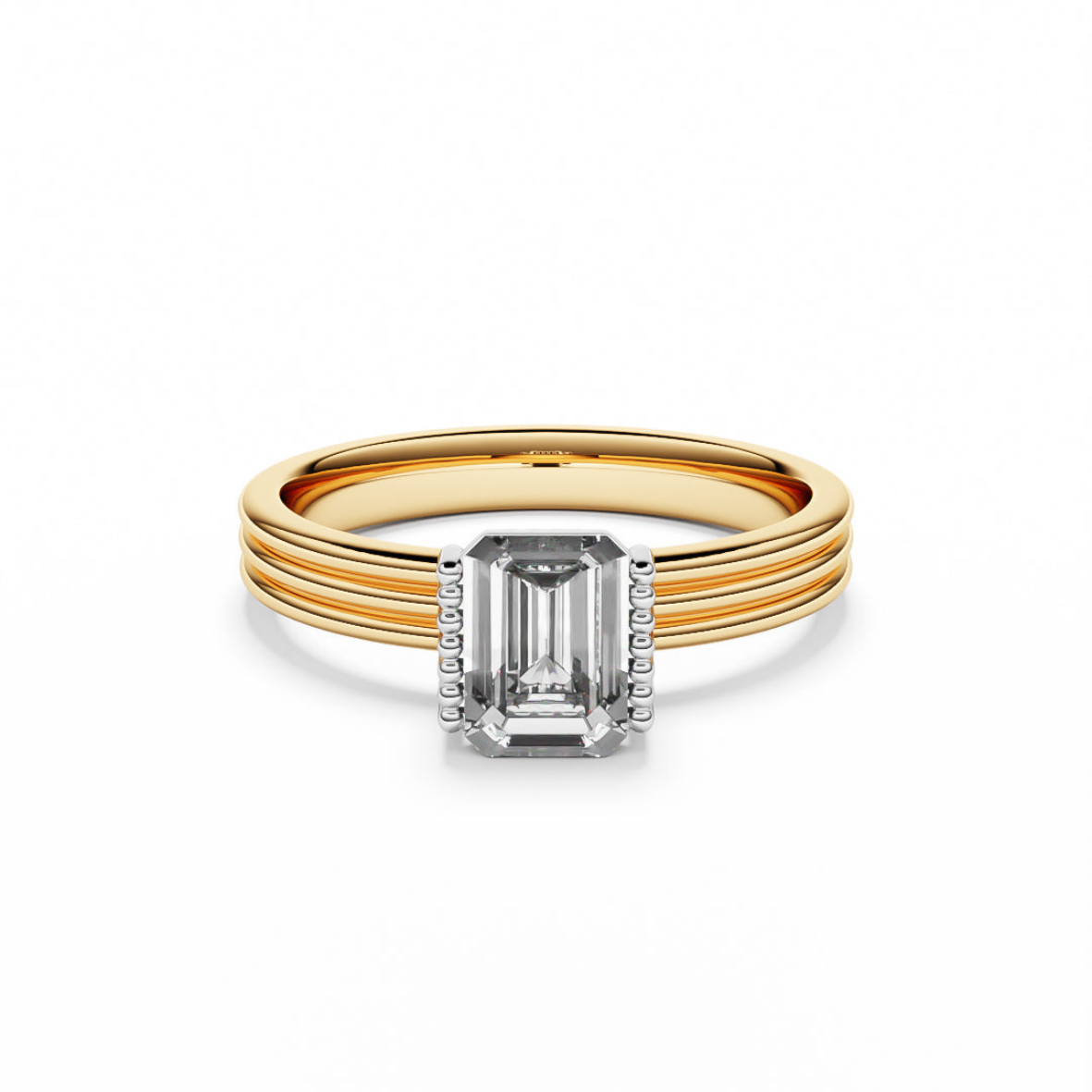 Yellow gold ring with emerald cut diamonds