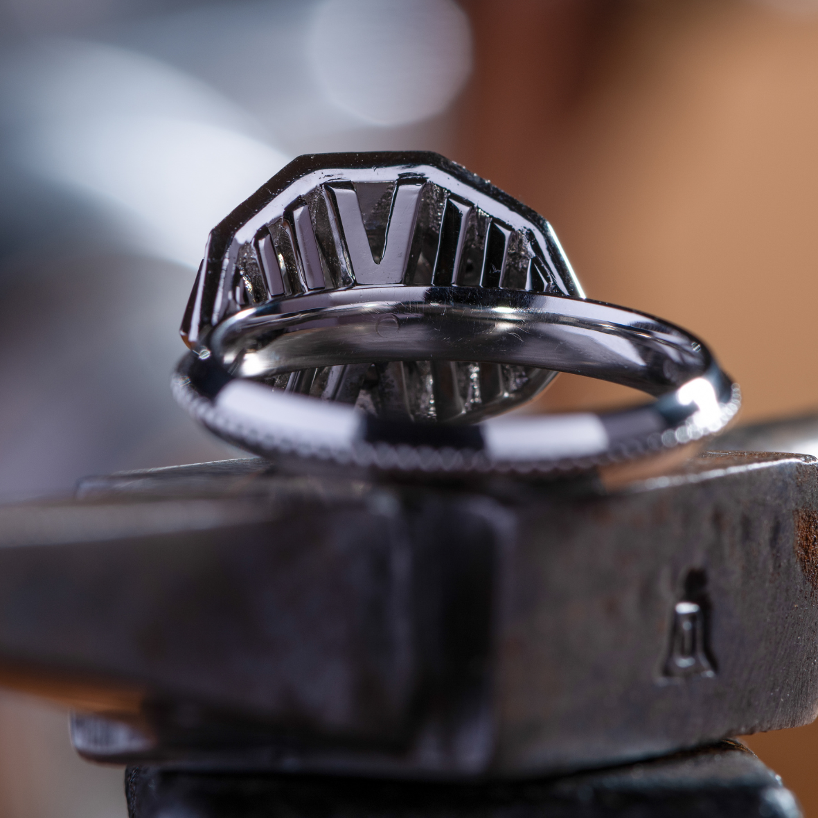 close up of platinum ring with round brilliant cut diamonds showing rings detailing