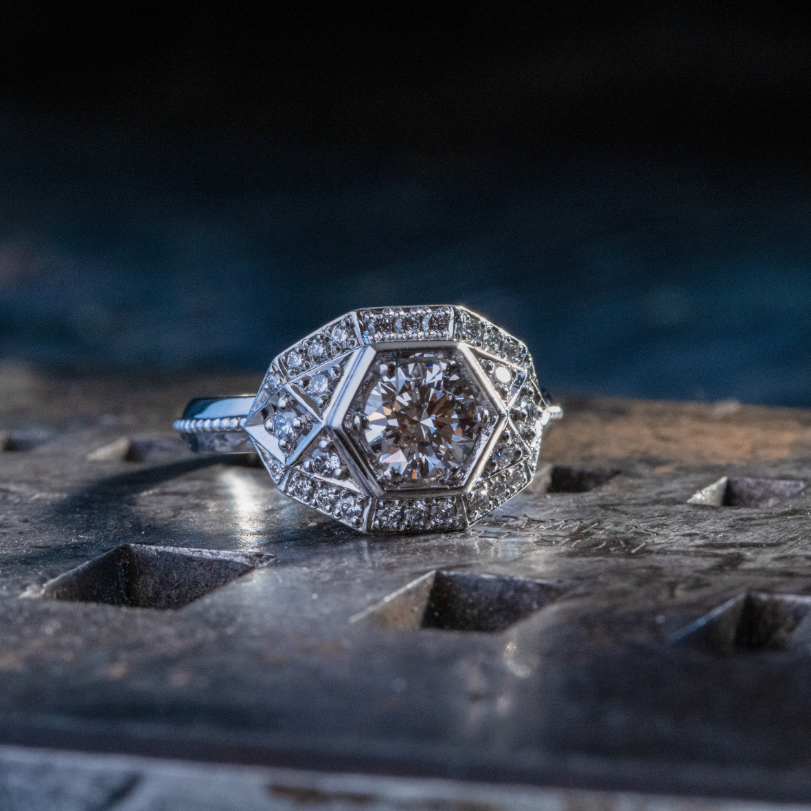 close up of platinum ring with round brilliant cut diamonds 
