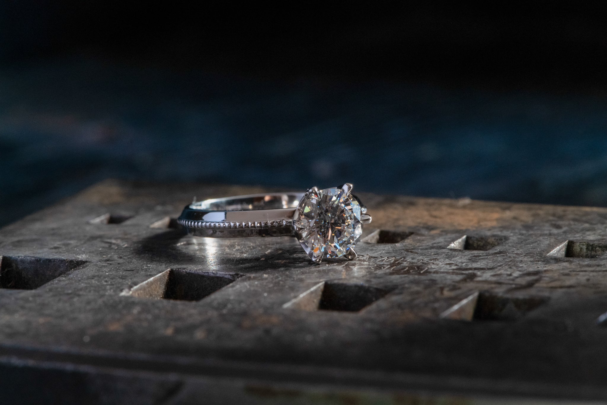 Close-up of a custom diamond ring with a platinum band