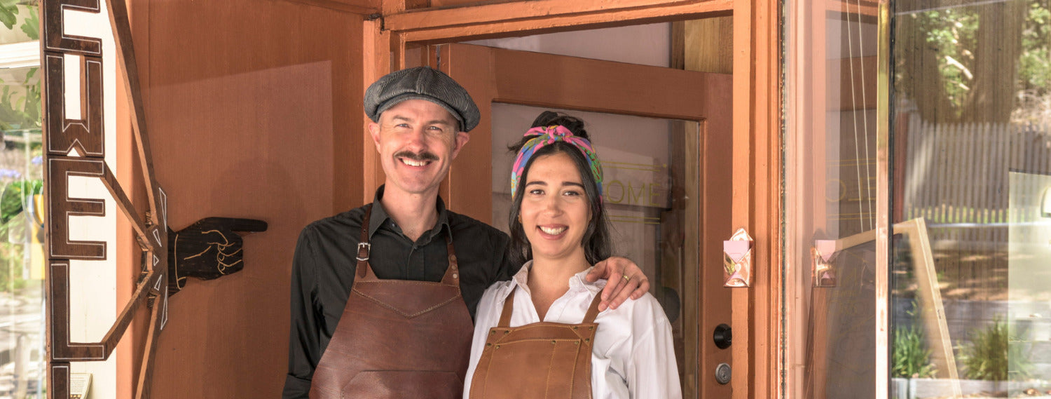 Terry Cockrem and Daria Fox in front on their store 